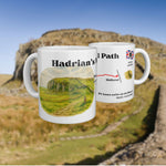 White mug with a watercolour map of the Hadrian's Wall Path, shown from two sides.
