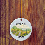 Basic version of The Kerry Way ornament in front of wooden door.