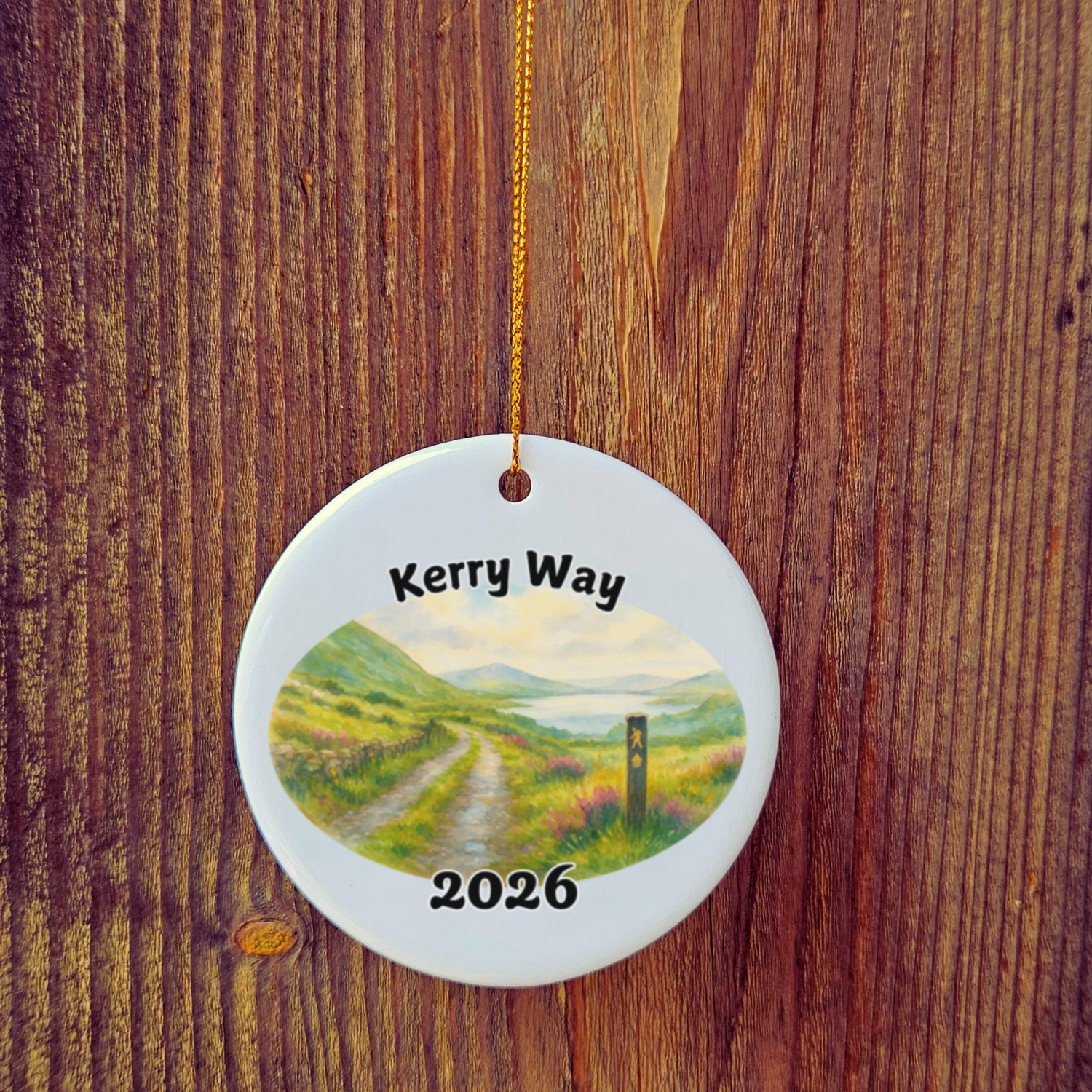 Basic version of The Kerry Way ornament in front of wooden door.