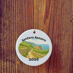 Basic version of Sentiero Azzurro ornament in front of wooden door.