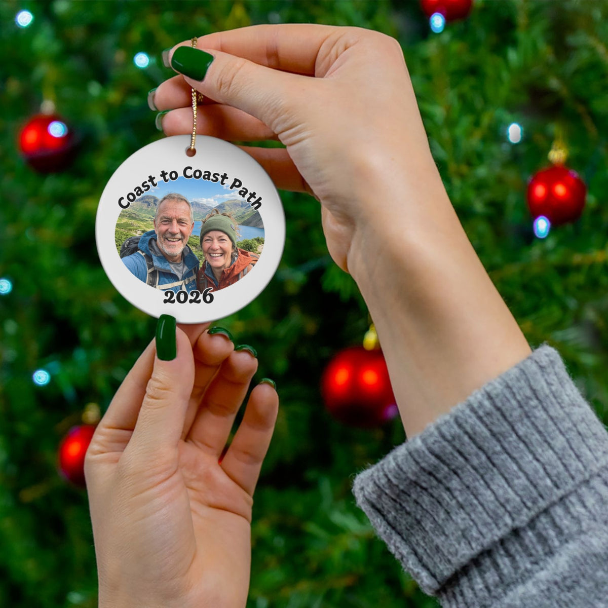 Coast to Coast Path photo ornament shown in front of Christmas tree.